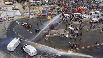 Police use water cannon during protests in Taksim Square in Turkey