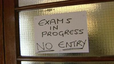 Exams in progress sign