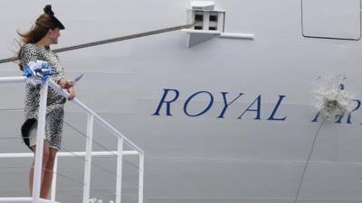 The Duchess of Cambridge watches a champagne bottle break against the Royal Princess cruise ship