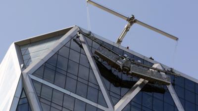 A collapsed maintenance platform hangs from the top of the Hears