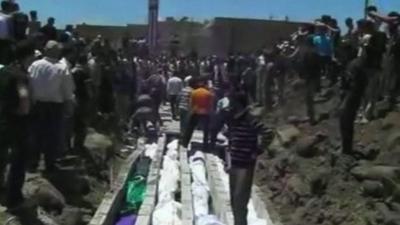 Bodies lined up in Syria