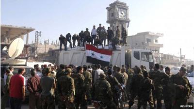 Soldiers loyal to the Syrian regime