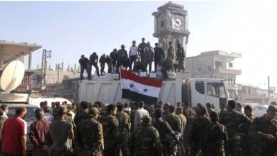 Soldiers loyal to the Syrian regime