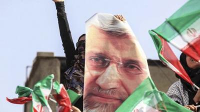 A supporter of Iranian presidential candidate Saeed Jalili