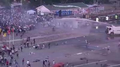 Water cannon firing on protesters in Taksim Square