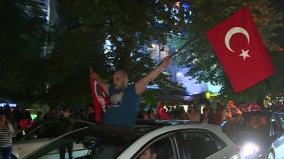 Protesters in Ankara with Turkish flags