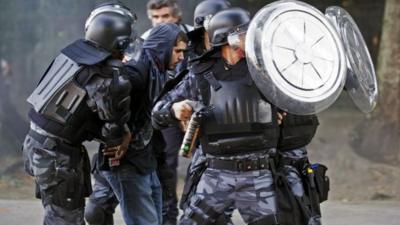 Riot police outside Maracana stadium