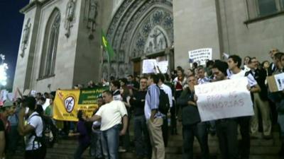 Protesters on the steps of Sao Paulo Cathedral