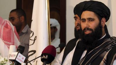 Muhammad Naeem a representative of the Taliban speaks during a press conference at the official opening of their office in Doha, Qatar