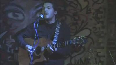 Jeremy Forrest playing the guitar