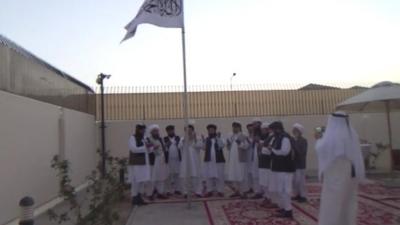 Still from video believed to be Taliban flag-raising in Doha