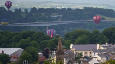 Balloons over city