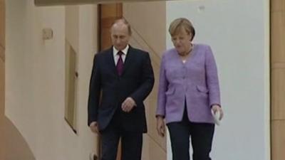 Putin and Merkel