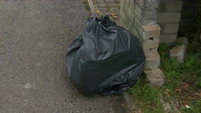 A bin bag on the street