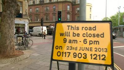 Road sign warning of closure to motor vehicles