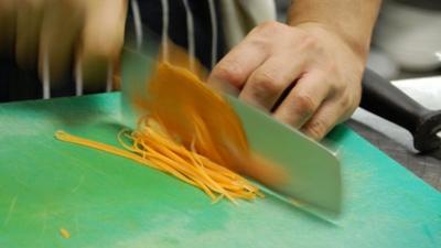 chef slicing pasta