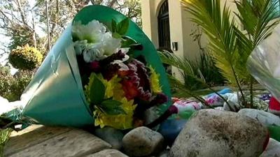 Flowers and messages of support for Nelson Mandela and his family