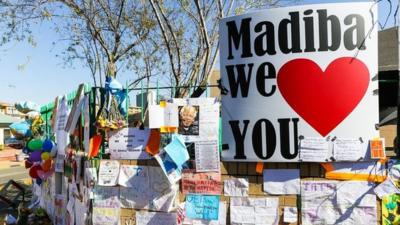 "Madiba we love you" is a constant theme among the messages on the wall, referring to the former South African leader by his clan name