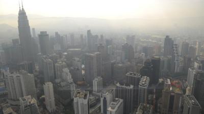 A haze hangs over Singapore and Malaysia