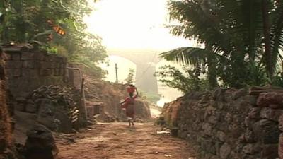 Woman on road in rural India