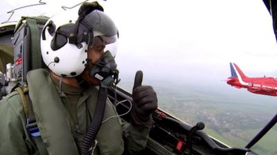 Lewis Hamilton flies with the Red Arrows