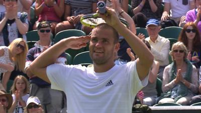 Mikhail Youzhny celebrates his third round victory