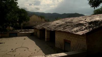 Empty town covered in mud following India's floods