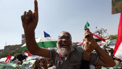 Supporters of Egyptian President Mohamed Mursi shout slogans during a protest