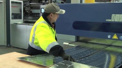 Worker in Australian sheet metal factory