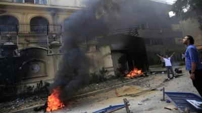 Protesters set fire to the Muslim Brotherhood's headquarters in Cairo