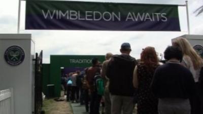 People queue to enter Wimbledon