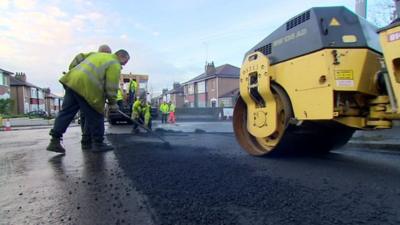 Council workers repairing road