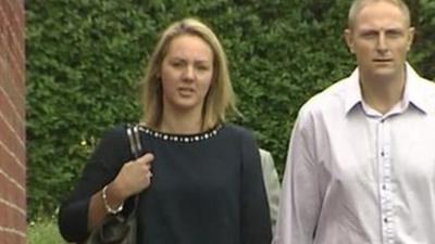 Sergeant Danny Nightingale (foreground) and his wife arrive at the military court