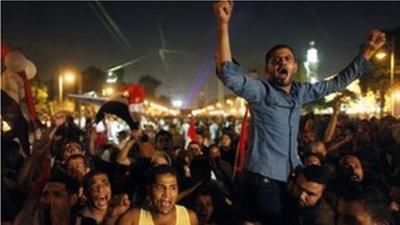 Egyptian protesters call for ousting of President Morsi near presidential palace in Cairo on 3 July