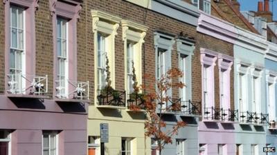 Multi-coloured Victoria terraced houses in Camden Town, north London.