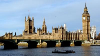 The sun rises at the Houses of Parliament