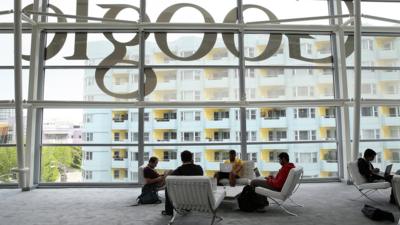 Attendees work on laptops during the Google I/O developers conference at the Moscone Center