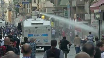 Water cannon on busy street