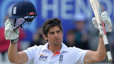 A picture dated May 27, 2013 shows England"s Alastair Cook celebrating reaching his century during the fourth day"s play in the second international cricket Test match between England and New Zealand