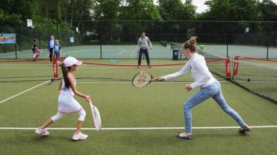 Children playing tennis