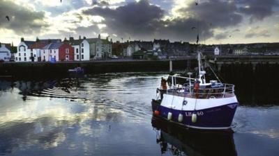 Trawler bringing in its catch