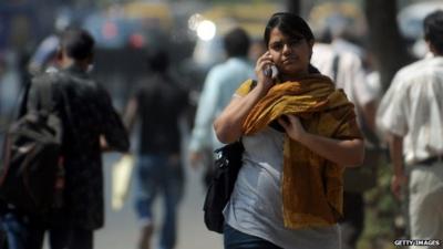 Indian woman with phone