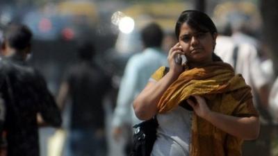 Indian woman with phone