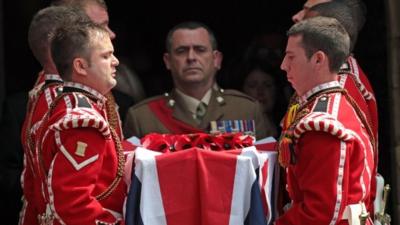 Royal Fusiliers carry the coffin of Fusilier Lee Rigby out of Bury Parish Church