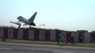 Typhoon near fence