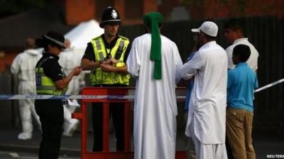 Residents speaking to police at cordon