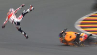 Dani Pedrosa comes off his bike