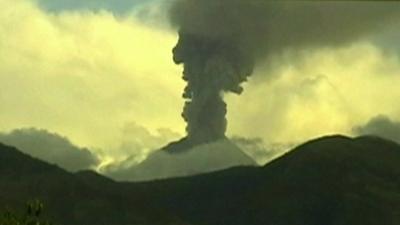 An ash column above the Tungurahua volcano in Ecuador