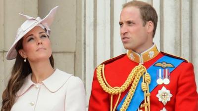 The Duchess and Duke of Cambridge stand on the balcony at Buckingham Palace during the Trooping the Colour parade 2013