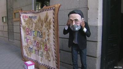 A Spanish protestor dressed as Mariano Rajoy